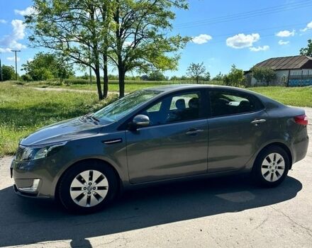 Серый Киа Рио, объемом двигателя 1.59 л и пробегом 140 тыс. км за 6600 $, фото 1 на Automoto.ua
