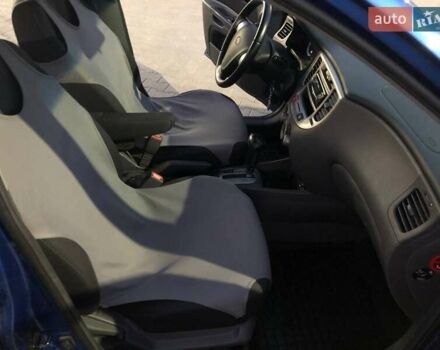 Синий Киа Рио, объемом двигателя 1.6 л и пробегом 134 тыс. км за 7000 $, фото 4 на Automoto.ua
