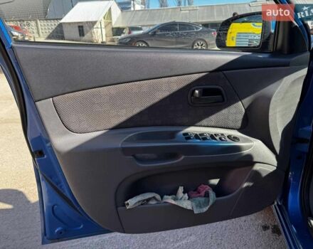 Синий Киа Рио, объемом двигателя 1.4 л и пробегом 343 тыс. км за 3490 $, фото 10 на Automoto.ua