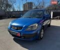 Синий Киа Рио, объемом двигателя 1.4 л и пробегом 343 тыс. км за 3490 $, фото 1 на Automoto.ua