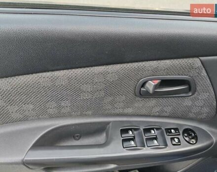 Синий Киа Рио, объемом двигателя 1.4 л и пробегом 339 тыс. км за 4800 $, фото 3 на Automoto.ua