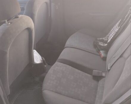 Синий Киа Рио, объемом двигателя 1.4 л и пробегом 190 тыс. км за 3500 $, фото 6 на Automoto.ua