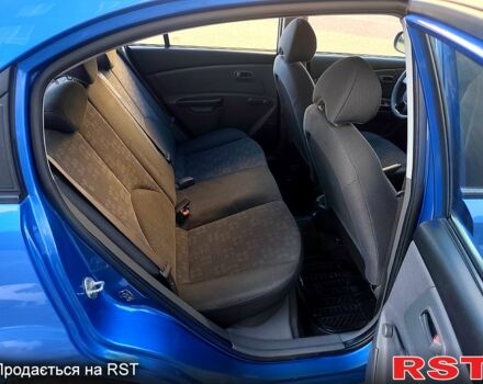 Синій Кіа Ріо, об'ємом двигуна 1.4 л та пробігом 165 тис. км за 4850 $, фото 10 на Automoto.ua