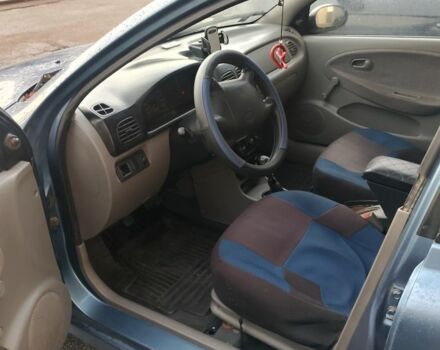 Синій Кіа Ріо, об'ємом двигуна 1.3 л та пробігом 260 тис. км за 1950 $, фото 5 на Automoto.ua