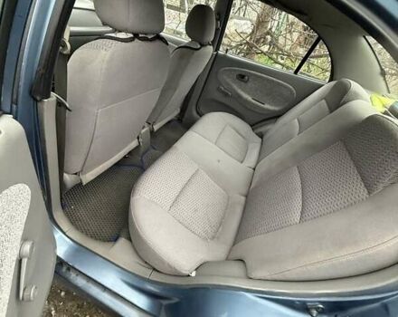 Синій Кіа Ріо, об'ємом двигуна 1.3 л та пробігом 296 тис. км за 2990 $, фото 3 на Automoto.ua