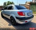 Синій Кіа Ріо, об'ємом двигуна 1.4 л та пробігом 261 тис. км за 4899 $, фото 4 на Automoto.ua