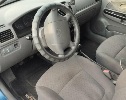 Синий Киа Рио, объемом двигателя 1.3 л и пробегом 205 тыс. км за 2300 $, фото 4 на Automoto.ua