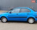 Синий Киа Рио, объемом двигателя 1.4 л и пробегом 310 тыс. км за 3450 $, фото 8 на Automoto.ua