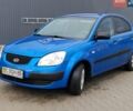 Синий Киа Рио, объемом двигателя 1.4 л и пробегом 310 тыс. км за 3450 $, фото 1 на Automoto.ua
