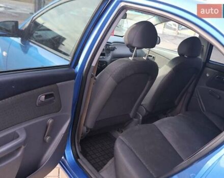 Синий Киа Рио, объемом двигателя 1.4 л и пробегом 175 тыс. км за 3499 $, фото 5 на Automoto.ua