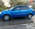 Синий Киа Рио, объемом двигателя 1.4 л и пробегом 308 тыс. км за 4500 $, фото 2 на Automoto.ua
