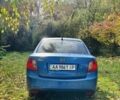 Синий Киа Рио, объемом двигателя 1.4 л и пробегом 250 тыс. км за 5200 $, фото 3 на Automoto.ua