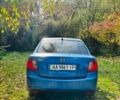 Синий Киа Рио, объемом двигателя 1.4 л и пробегом 300 тыс. км за 4700 $, фото 2 на Automoto.ua
