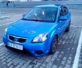 Синий Киа Рио, объемом двигателя 1.4 л и пробегом 185 тыс. км за 5650 $, фото 1 на Automoto.ua