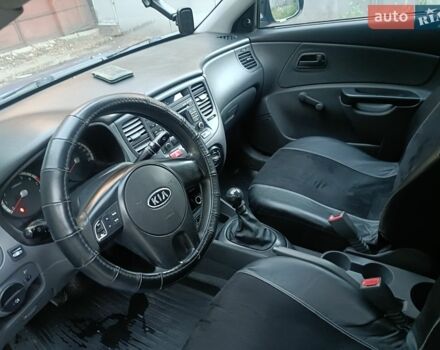 Синий Киа Рио, объемом двигателя 1.4 л и пробегом 215 тыс. км за 3390 $, фото 8 на Automoto.ua