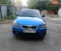 Синий Киа Рио, объемом двигателя 1.4 л и пробегом 215 тыс. км за 3390 $, фото 2 на Automoto.ua