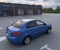 Синий Киа Рио, объемом двигателя 1.4 л и пробегом 220 тыс. км за 3799 $, фото 1 на Automoto.ua