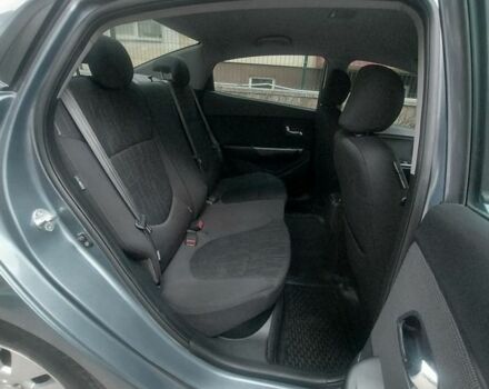 Синій Кіа Ріо, об'ємом двигуна 1.6 л та пробігом 182 тис. км за 7900 $, фото 12 на Automoto.ua