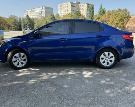 Синій Кіа Ріо, об'ємом двигуна 1.4 л та пробігом 212 тис. км за 6999 $, фото 3 на Automoto.ua