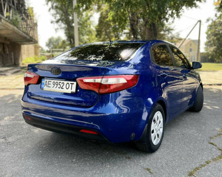 Синій Кіа Ріо, об'ємом двигуна 1.4 л та пробігом 212 тис. км за 6999 $, фото 1 на Automoto.ua