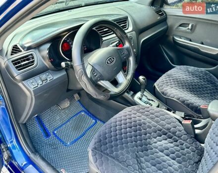 Синий Киа Рио, объемом двигателя 1.6 л и пробегом 190 тыс. км за 5999 $, фото 14 на Automoto.ua