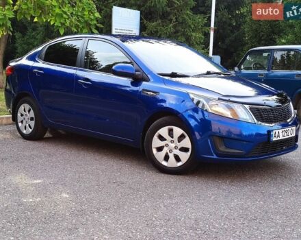 Синий Киа Рио, объемом двигателя 1.4 л и пробегом 129 тыс. км за 7600 $, фото 1 на Automoto.ua