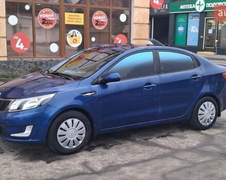 Синий Киа Рио, объемом двигателя 1.4 л и пробегом 213 тыс. км за 7400 $, фото 1 на Automoto.ua