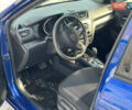 Синий Киа Рио, объемом двигателя 1.4 л и пробегом 139 тыс. км за 7700 $, фото 3 на Automoto.ua