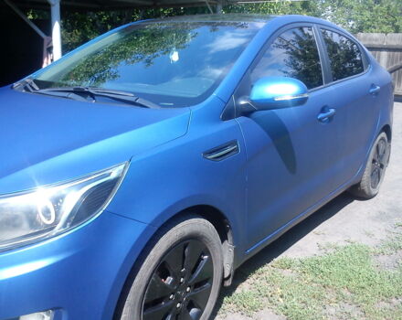Синий Киа Рио, объемом двигателя 1.6 л и пробегом 54 тыс. км за 8700 $, фото 2 на Automoto.ua