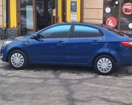 Синий Киа Рио, объемом двигателя 1.4 л и пробегом 213 тыс. км за 7400 $, фото 2 на Automoto.ua
