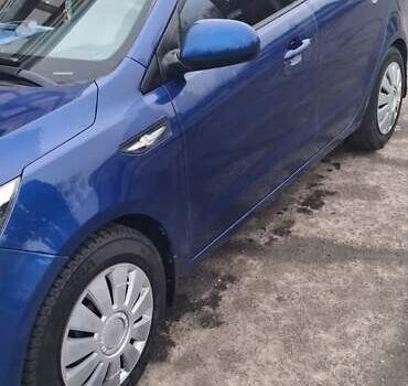 Синий Киа Рио, объемом двигателя 1.4 л и пробегом 213 тыс. км за 7400 $, фото 3 на Automoto.ua