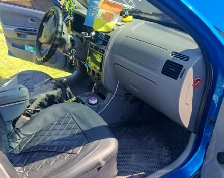 Синий Киа Рио, объемом двигателя 1.3 л и пробегом 230 тыс. км за 3300 $, фото 2 на Automoto.ua