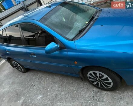 Синий Киа Рио, объемом двигателя 1.3 л и пробегом 266 тыс. км за 3500 $, фото 5 на Automoto.ua