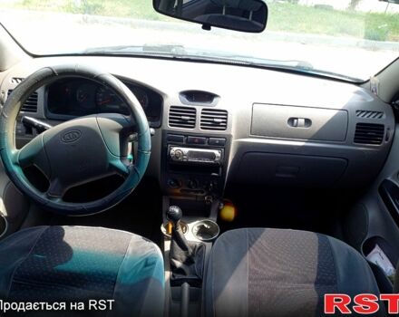 Синій Кіа Ріо, об'ємом двигуна 1.4 л та пробігом 262 тис. км за 2600 $, фото 9 на Automoto.ua