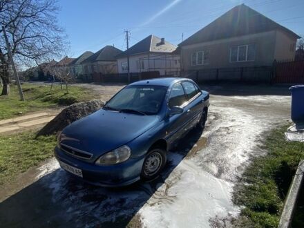 Синий Киа Рио, объемом двигателя 1.5 л и пробегом 200 тыс. км за 600 $, фото 1 на Automoto.ua