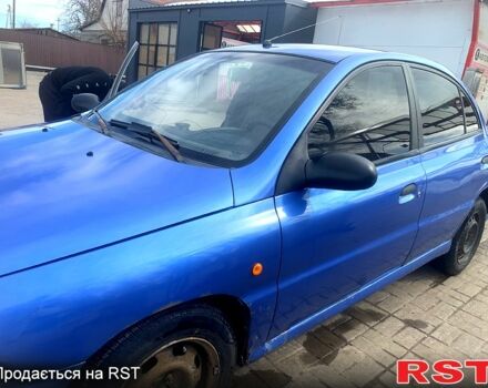 Синий Киа Рио, объемом двигателя 1.3 л и пробегом 445 тыс. км за 1700 $, фото 1 на Automoto.ua