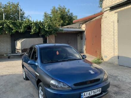 Синий Киа Рио, объемом двигателя 1.34 л и пробегом 320 тыс. км за 1900 $, фото 1 на Automoto.ua