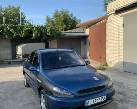 Синий Киа Рио, объемом двигателя 1.34 л и пробегом 320 тыс. км за 1900 $, фото 1 на Automoto.ua