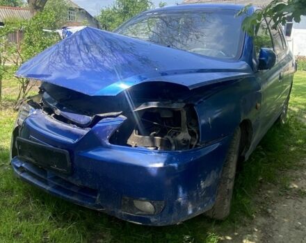 Синий Киа Рио, объемом двигателя 1.3 л и пробегом 280 тыс. км за 800 $, фото 1 на Automoto.ua
