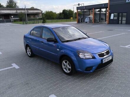 Синий Киа Рио, объемом двигателя 1.4 л и пробегом 215 тыс. км за 3999 $, фото 1 на Automoto.ua