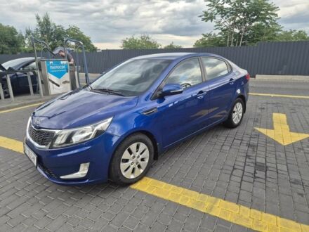 Синий Киа Рио, объемом двигателя 1.6 л и пробегом 150 тыс. км за 8371 $, фото 1 на Automoto.ua