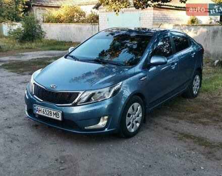 Синій Кіа Ріо, об'ємом двигуна 1.4 л та пробігом 138 тис. км за 8300 $, фото 1 на Automoto.ua