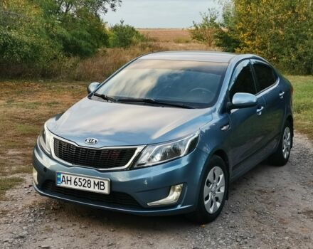 Синий Киа Рио, объемом двигателя 1.4 л и пробегом 138 тыс. км за 8300 $, фото 1 на Automoto.ua