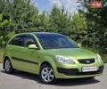 Зеленый Киа Рио, объемом двигателя 1.4 л и пробегом 203 тыс. км за 4299 $, фото 1 на Automoto.ua