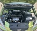 Зеленый Киа Рио, объемом двигателя 1.4 л и пробегом 284 тыс. км за 3899 $, фото 7 на Automoto.ua