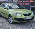 Зеленый Киа Рио, объемом двигателя 1.4 л и пробегом 284 тыс. км за 3800 $, фото 1 на Automoto.ua