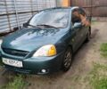 Зеленый Киа Рио, объемом двигателя 1.3 л и пробегом 129 тыс. км за 2800 $, фото 1 на Automoto.ua