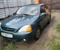 Зелений Кіа Ріо, об'ємом двигуна 1.3 л та пробігом 129 тис. км за 2800 $, фото 3 на Automoto.ua