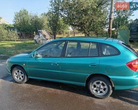 Зеленый Киа Рио, объемом двигателя 1.5 л и пробегом 270 тыс. км за 2600 $, фото 4 на Automoto.ua