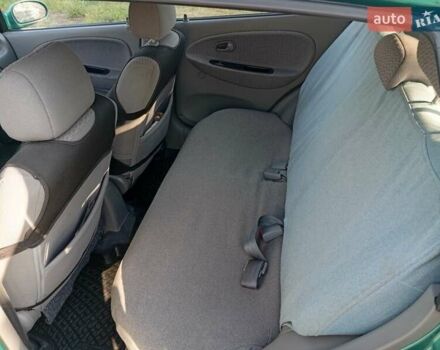 Зеленый Киа Рио, объемом двигателя 1.5 л и пробегом 270 тыс. км за 2600 $, фото 10 на Automoto.ua